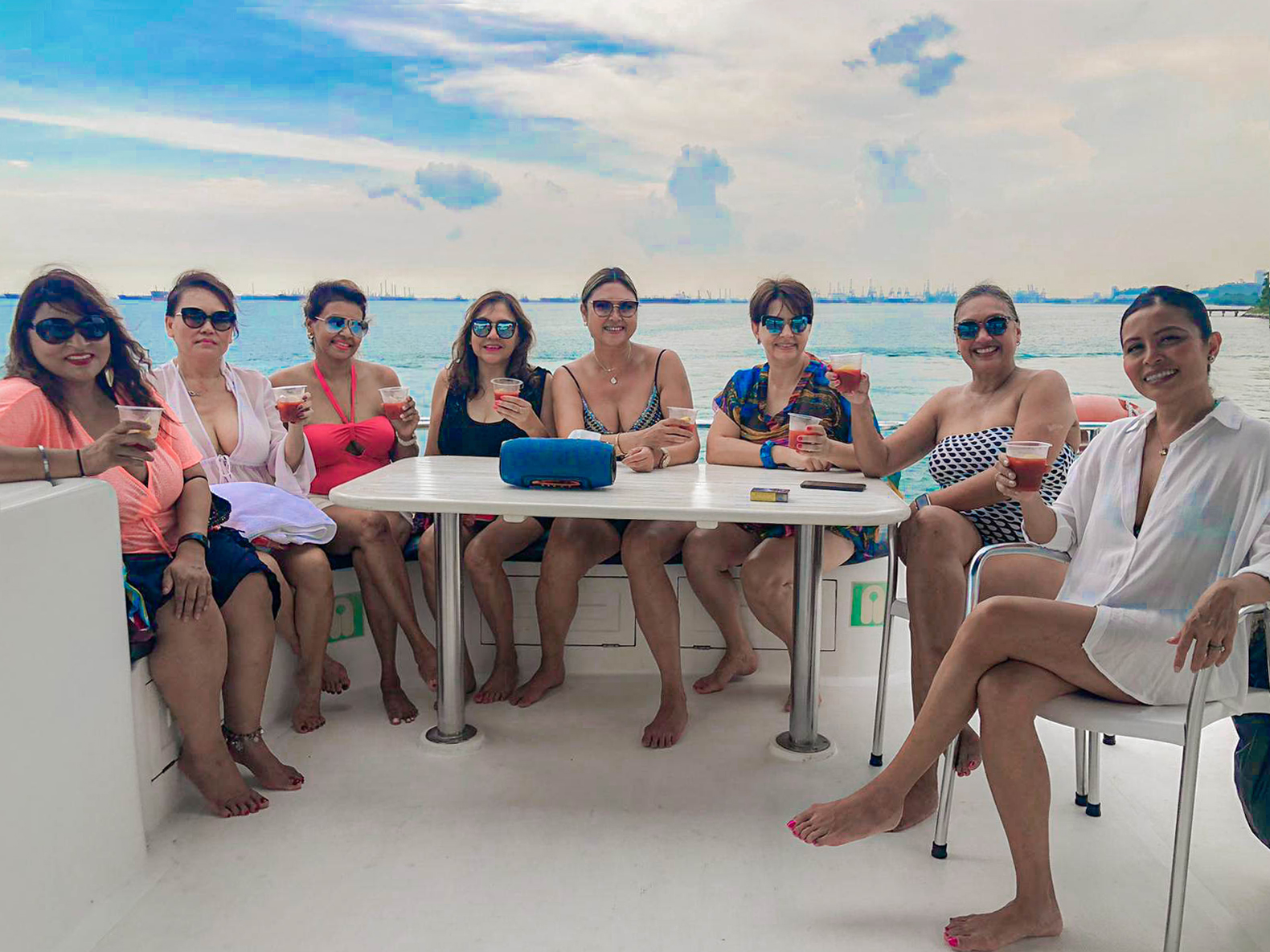 Guests relaxing on deck during an afternoon charter