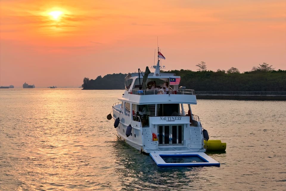 The stern at sunset with the floating pool deployed off the swim platform